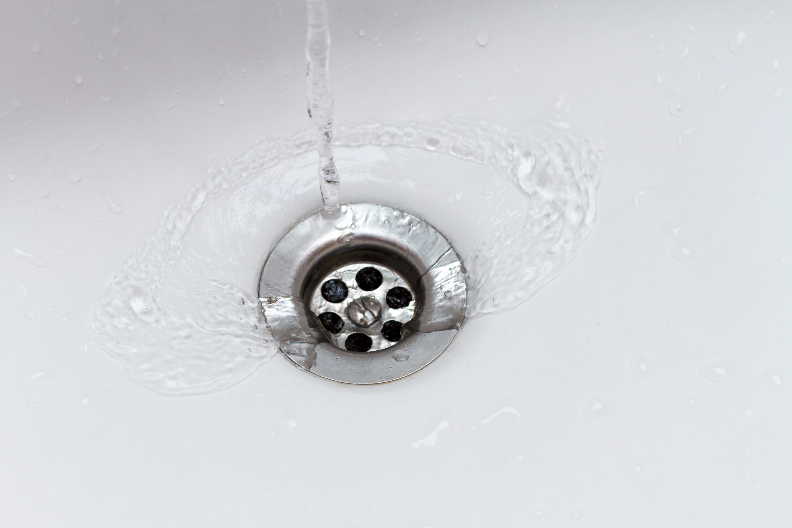 Slow draining sinks, showers, tubs and toilets